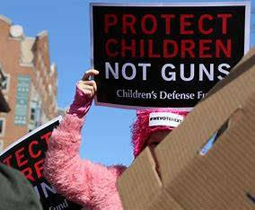 sign-protect children-not-guns